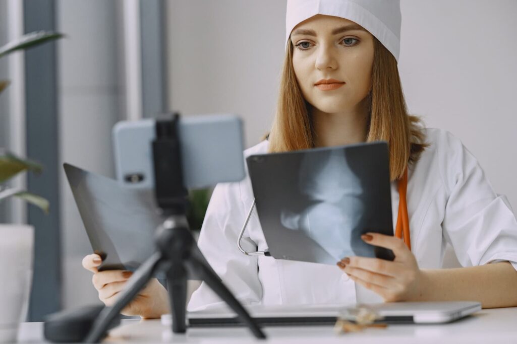 Female doctor examining x-ray