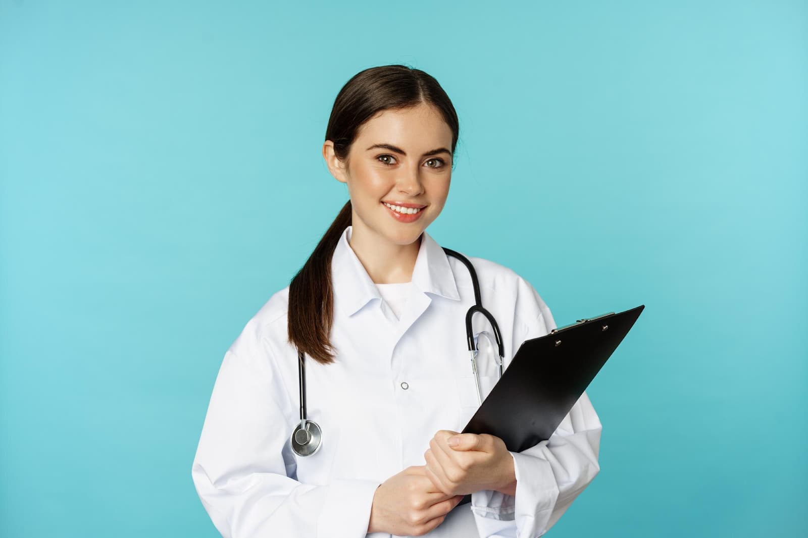 Woman doctor with tablet